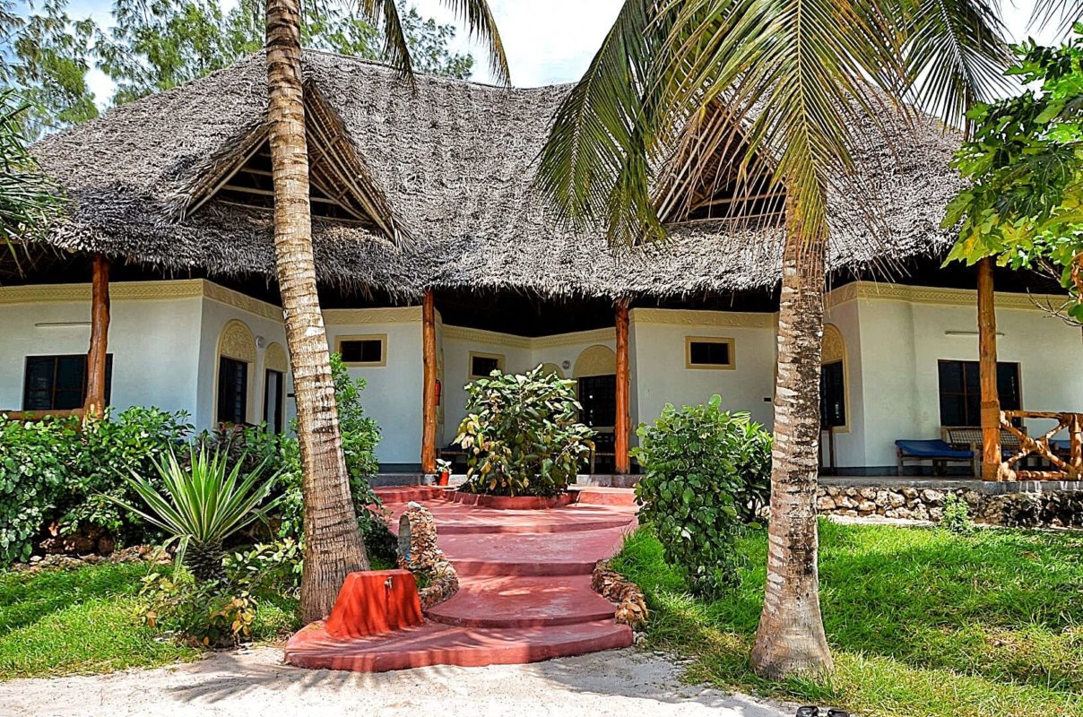 beach cottages at Pongwe Beach Hotel