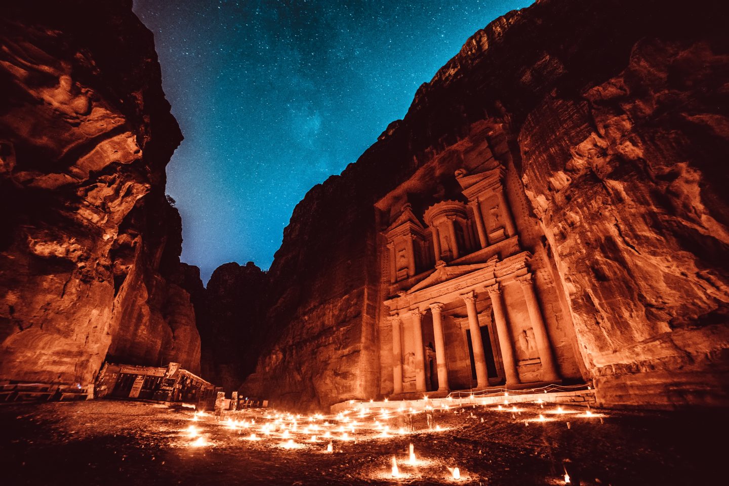 Petra By Night under a starry sky.